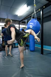 Demonstrating a knee on a bag